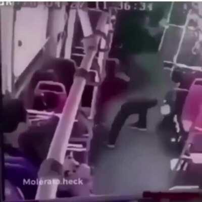 kid gets stamped three times on head by a man on the bus