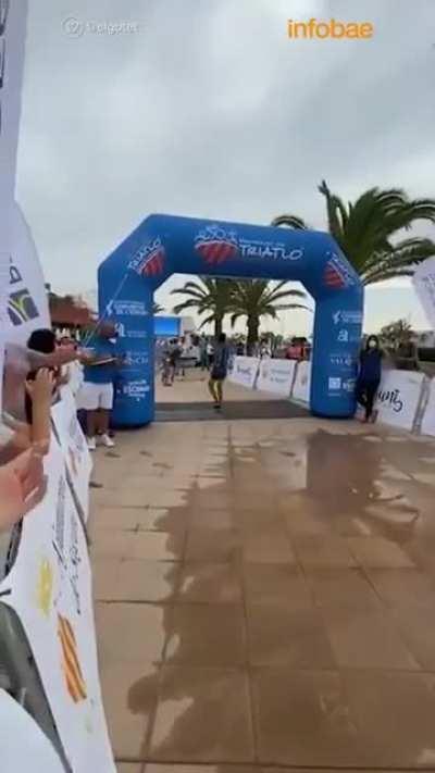 Stopping to celebrate a few metres before the finish line