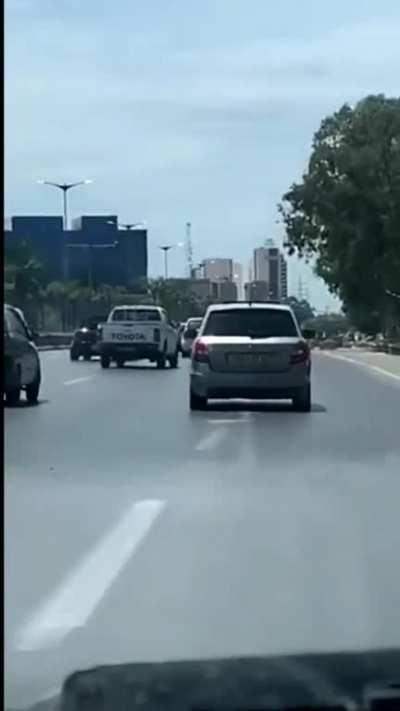 Bullies harass a new driver and cause him to crash