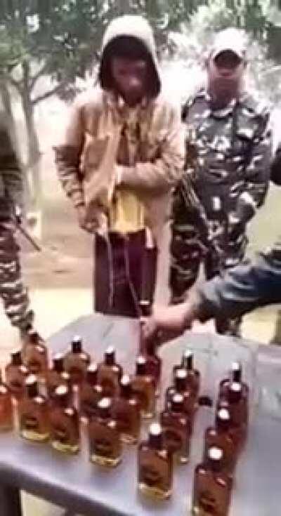 At how many bottles this skinny guy was hiding...