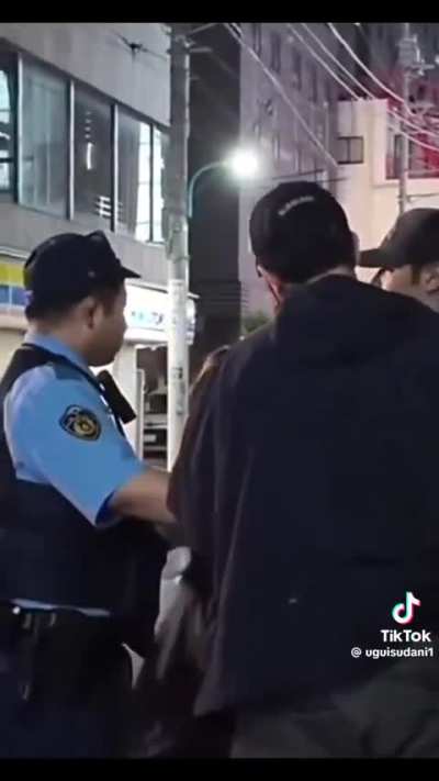 In Shinjuku, a Japanese woman says a tourist groped her and another splashed water, prompting police intervention.