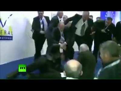 Assasinating with a faulty gun in front of the guy's supporters