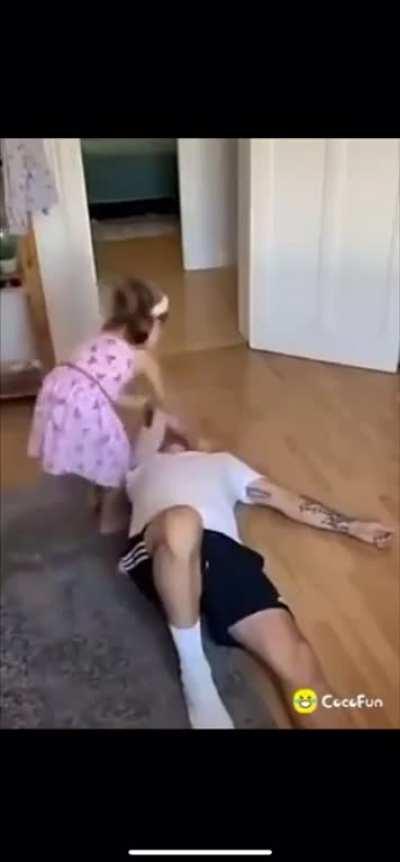 kid helps sleppy perent wake up.