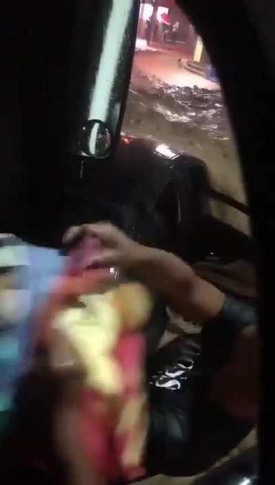 In Brazil, a man saves a family (two children and their mother) from being swept away by a strong flood