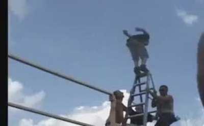 Bah Gawd King! A moonsault! From off the top of the ladder!