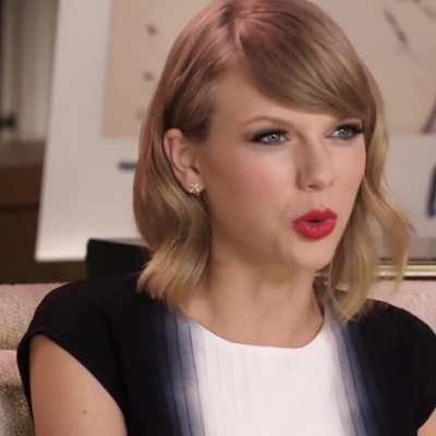 Taylor Swift Double Crossed Legs