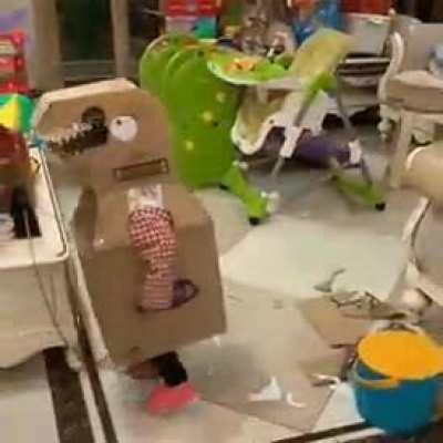 Turning into a cardboard dinosaur