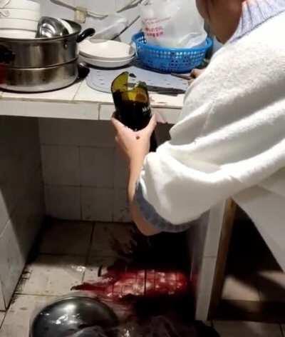 To open a bottle of wine with a knife