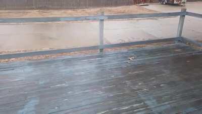 Doggo sliding across deck