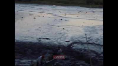 A sinkhole opens up in a dam in Franca, Brazil nearly taking the lives of two fishermen