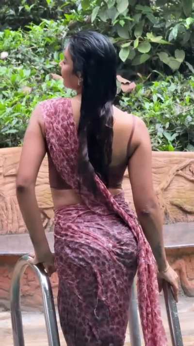 Beautiful brown girl in pool