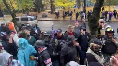 BLM woman calls Antifa woman a cracker. Antifa woman responds with the n-word.