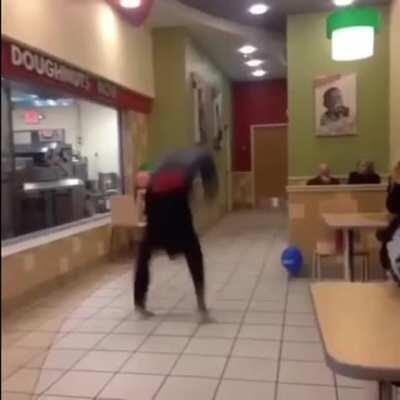 Exaggerated swagger of a black teen