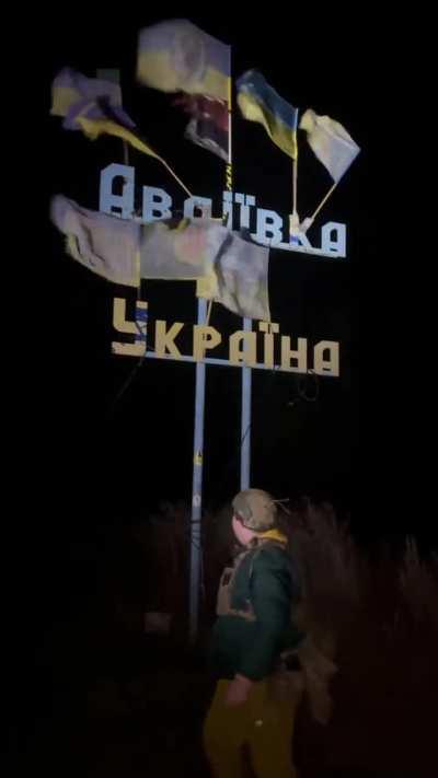 UA POV: Ukrainian soldier takes a video of him infront of the Avdeevka sign