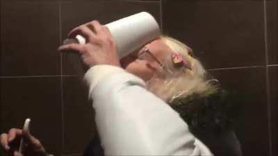 Man drinks toilet brush water