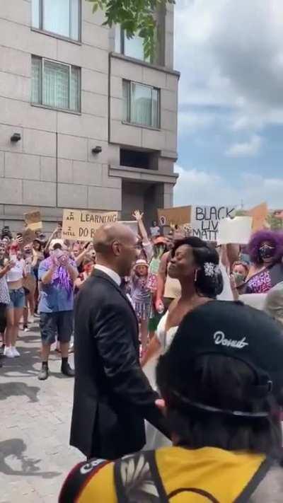 Couple at Philly gets married at protest