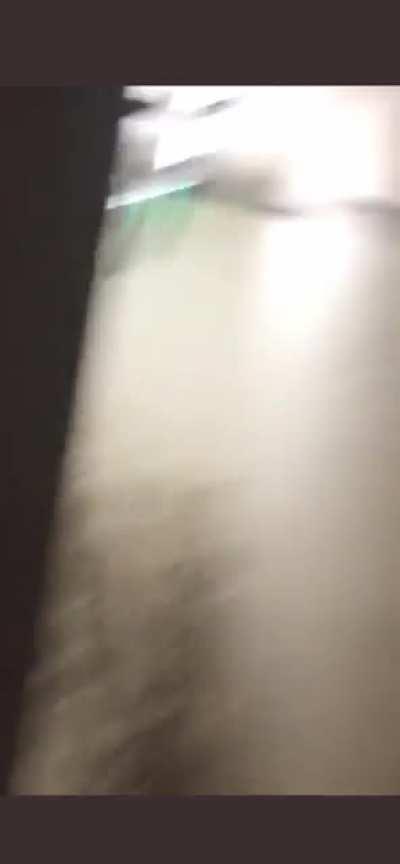 Door blasts open due to water pressure from Ivan.