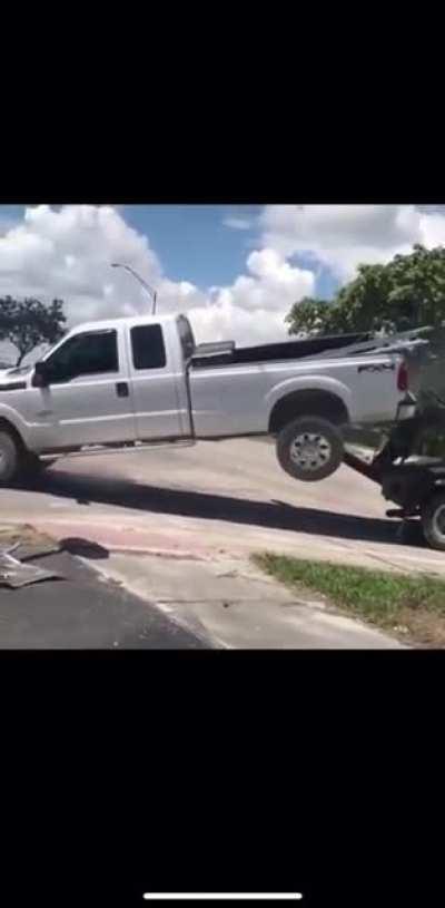 Trying to prevent fines by driving your truck while it’s getting towed