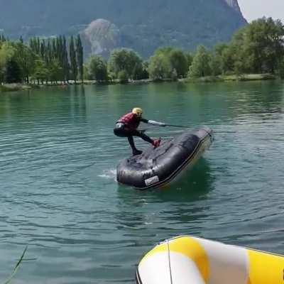 Technique for flipping an overturned raft without getting wet