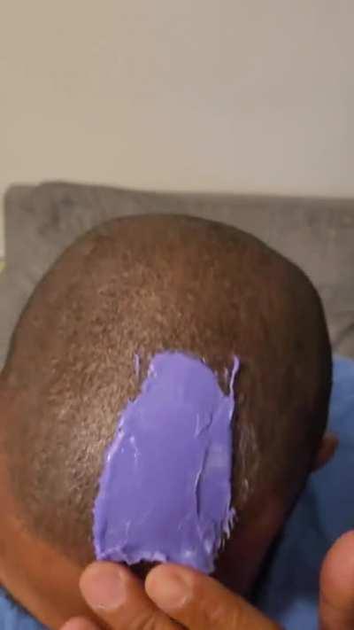 Trying to wax my husband's head