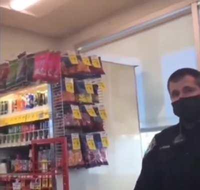 Mask-less guy stands up for constitutional rights