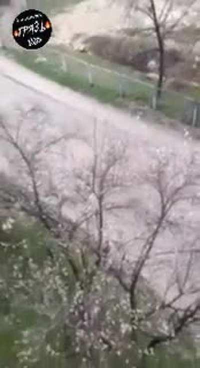 Shoots a junkie from his apartment window