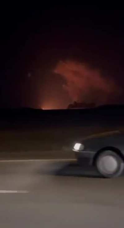 Footage that was reportedly taken near Qom, Iran where the Fordow facility is located. A large fire can be viewed in the distance. This comes after reports of strikes in the area.