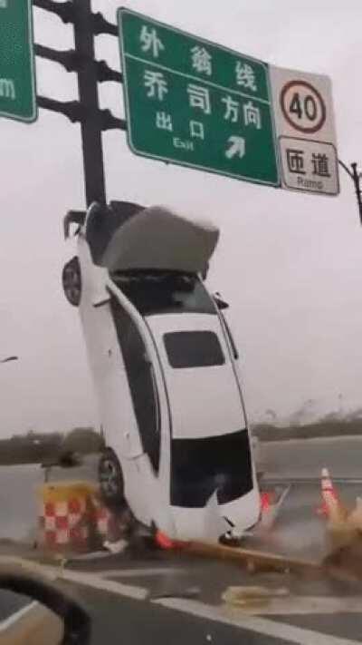 Whoops, don't text and drive... glad they made it out safely...