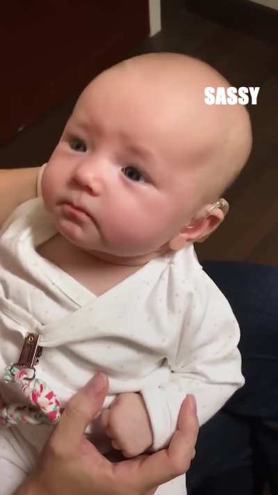 Baby who just got hearing aids hears her mom for the first time 🥰
