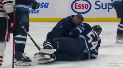 Dylan Samberg accidentally blocks a shot from the point with his groin, and is in considerable pain after.