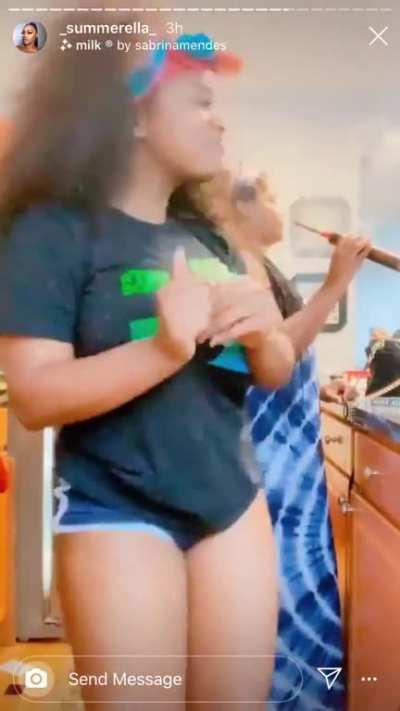 Showing off her lil cake