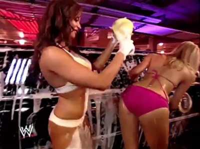 Ashley Massaro makes her WWE pay-per-view debut at SummerSlam 2005 in the WWE Divas Bikini Car Wash alongside Torrie Wilson, Maria Kanellis, Candice Michelle, and Stacy Keibler.❤️🤍🩷🖤💛💜