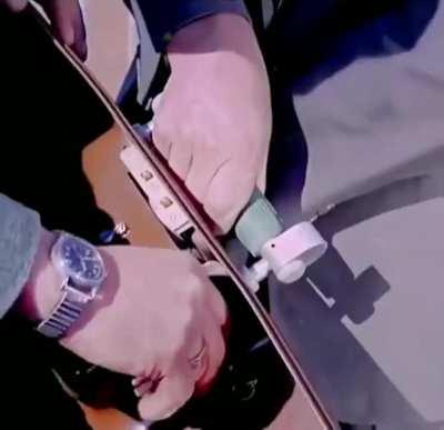 A suitcase anti-theft system presented in 1961