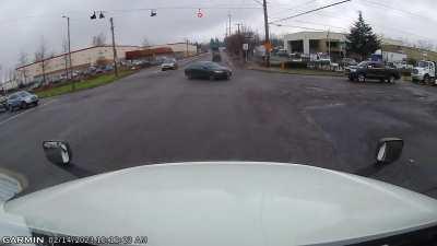 Idiots ignore 4-way stop to beat the semi truck.