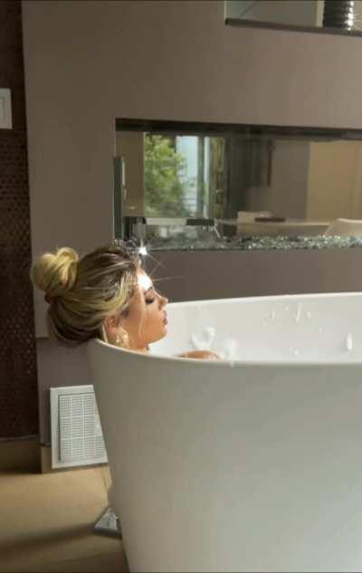 Elegant Lady in Bathtub