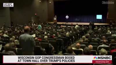 Rep. Bryan Steil (R-WI) gets booed and dragged at his own town hall over Trump's policies. Crowd cheers when he gets hit with: “I don’t think you’re the right fit for us anymore.”