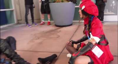 Emiru giving her socks to ExtraEmily at Comic-Con - July 2025