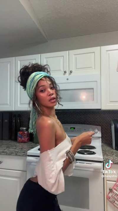 Tai'aysha in another attempt at wearing a shirt