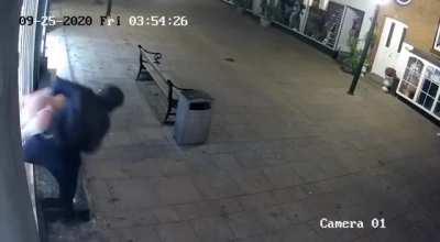 Dude breaks shop window… is he horny?