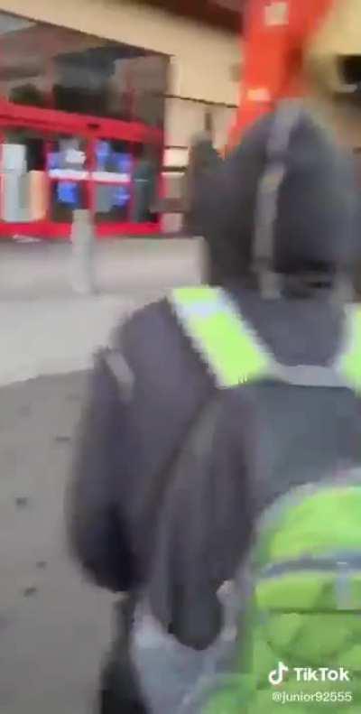 Looters use a forklift to destroy the front of a Best Buy, and begin looting.