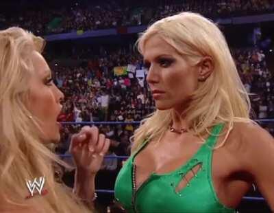 Sable kisses Torrie Wilson, causing Torrie's nipple to get hard.