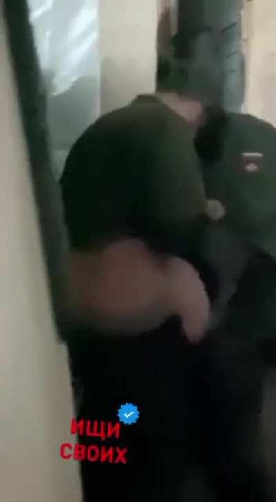 NSFW: A Russian disciplinary officer actually committed assault on a newly immobilized soldier who was reluctant to deploy to the front lines.