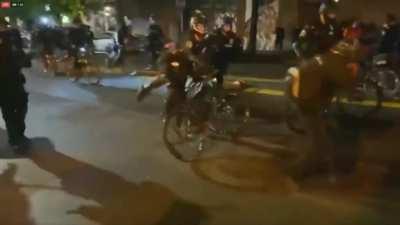 Seattle police roll bike over protesters neck - 23rd September