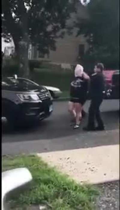 Emo girl gets taken away in a spit mask after going on crazy rampage in neighbors front yard, only in Bristol CT