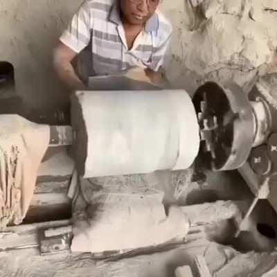 These guys carving a block of stone