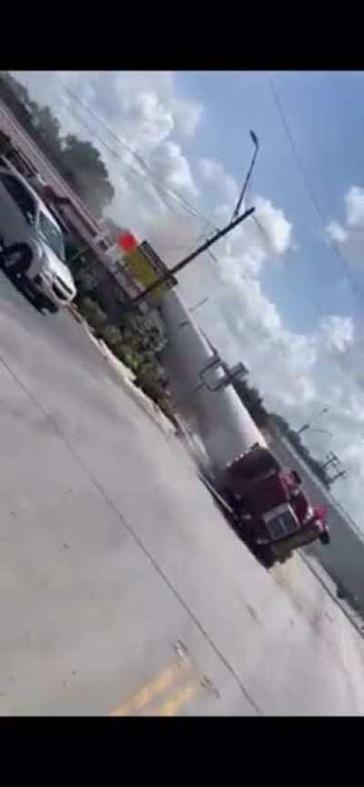 Train collides into a semi-truck hauling a wind turbine blade