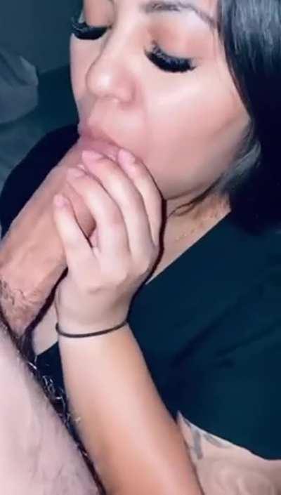 Sucking on his head because she can only take him half-way