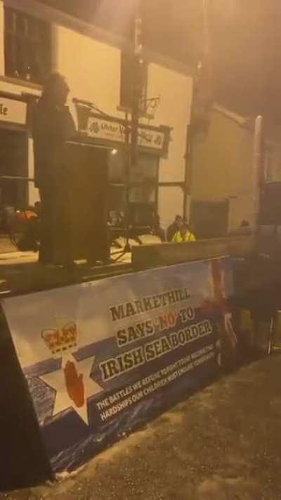 Sammy Wilson laughed at and called traitor while begging loyalists to allow him to speak