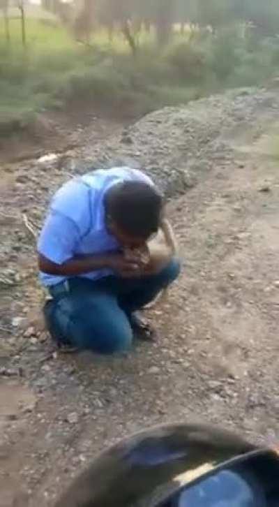 A man from TN India saves an injured monkey by doing CPR