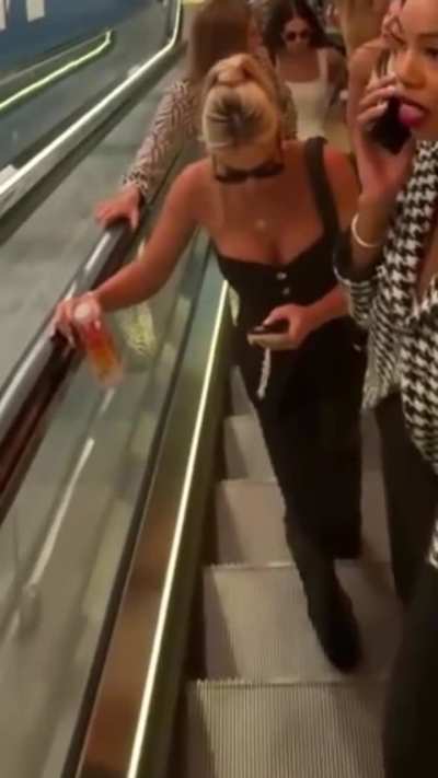 Busty on the escalator